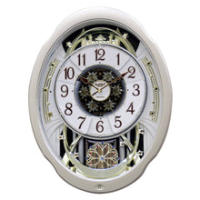 Load image into Gallery viewer, Moving Face Pendulum Wall Clock - Plays Melodies Every Hour
